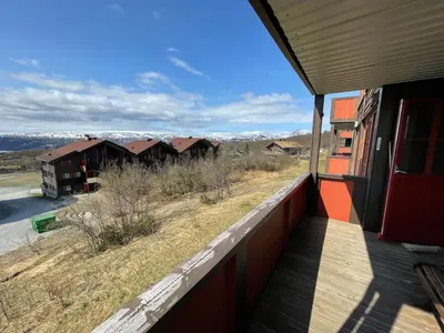 a view from the balcony of a house at Comfort, Sauna & Great Location! in Beitostøl