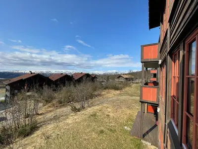 a view of a house from the side of a building at Comfort, Sauna & Great Location! in Beitostøl