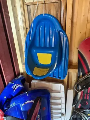 a blue and yellow helmet hanging on a wall at Convenient ski in-out on Norefjell in the alpine village in Surteberg