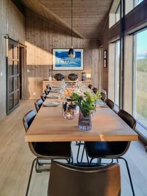 a large conference room with a long table and chairs at Experience Mountain Magic At Bringsfjellet in Lalm