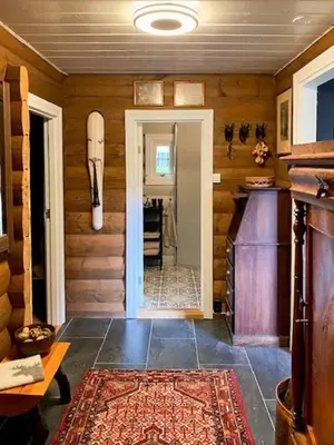 a room with a door leading to a dining room at Cabin In Rauland Near Fishing, Hiking And Skiing in Rauland