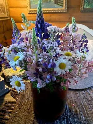 a vase filled with flowers sitting on a table at Cabin In Rauland Near Fishing, Hiking And Skiing in Rauland
