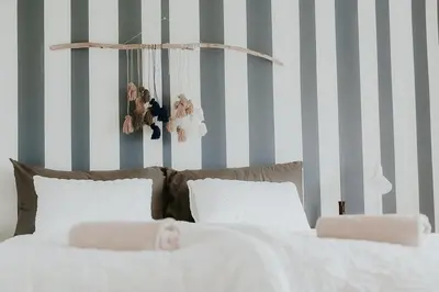 a bedroom with two beds with teddy bears and stuffed animals at Unique House On The Waterfront On Veiholmen in Smøla