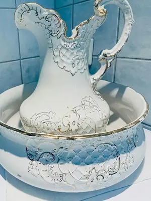 a blue and white vase sitting on a table at Charming Southern Norway Idyll On Trøndelag Coast in Sula