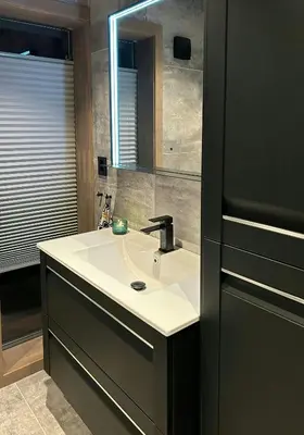 a bathroom with a sink and a mirror at Cabin With Panoramic Views In Turufjell in Flå