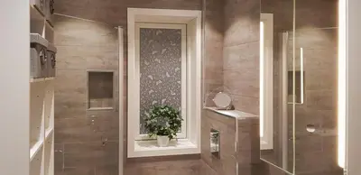 a bathroom with a shower with a plant in a window at Seaside Dream Cabin With Jacuzzi in Steinsland