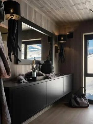 a kitchen with a large mirror on the wall at Unique & Exclusive Mountain Cabin In Geilo in Geilo