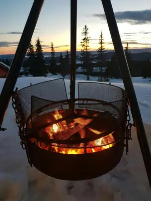 a fire seat on a ski lift in the snow at Sunny Cabin With Panoramic Views At Sjusjøen in Sjusjøen