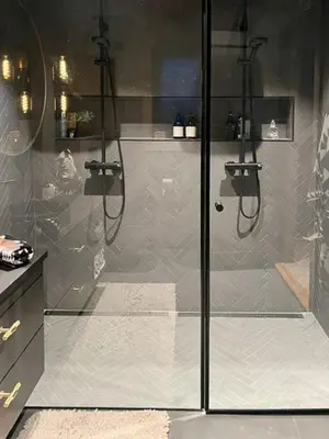 a shower with a glass door in a bathroom at Mountain Home On Høgevarde With Majestic Views in Flå