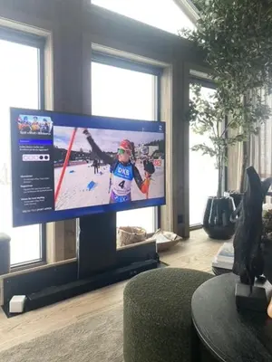 a flat screen tv in a living room with a tvicterictericter at Mountain Home On Høgevarde With Majestic Views in Flå