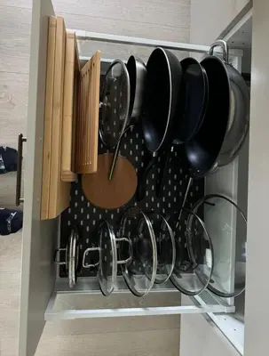 a drawer filled with pots and pans in a kitchen at Lodge Orkanger - Spacious Comfort - Designed for family moments in Orkanger