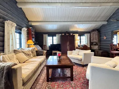 a living room with couches and a coffee table at Large, cozy, and spacious cabin in Geilo in Geilo