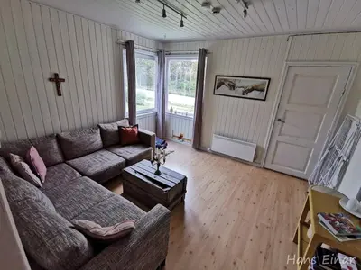 a living room with a couch and a table at Hemsedal - 7 bedrooms - WI-FI in Hemsedal