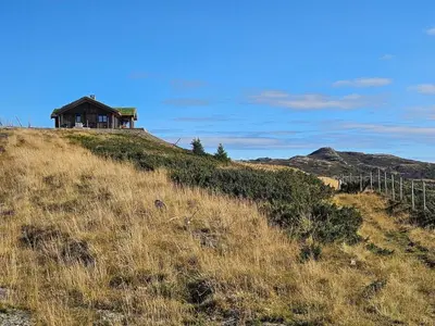 a house on the top of a hill at Utsikten in Sør-Fron
