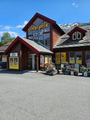 a store with a sign on the front of it at Mountain view 1 in Håra