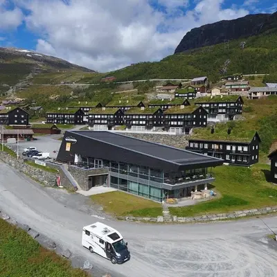 a white van parked in front of a building at Mountain view 1 in Håra