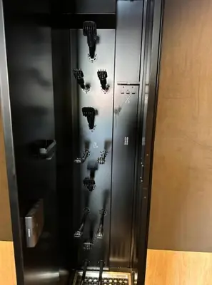 a metal elevator with many different types of weapons at Cozy ski in & out apartment in Kyrkjebøen