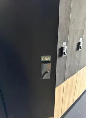 a close up of a door with a sign on it at Cozy ski in & out apartment in Kyrkjebøen