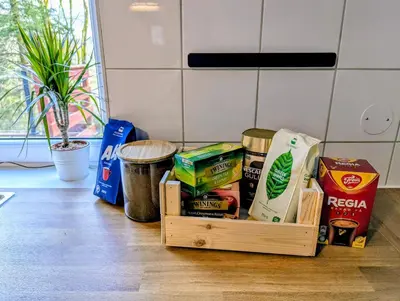 a crate of food sitting on the floor in a kitchen at Fjord View Cabin Near Bergen & Nature in Grottveit