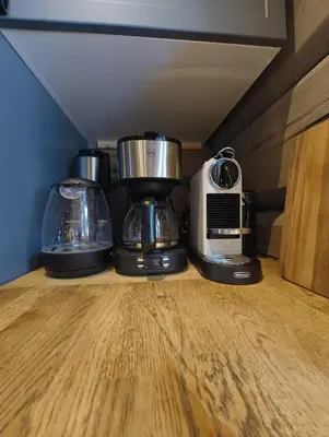three appliances sitting on a counter in a kitchen at Bånseterlodgen in Favang