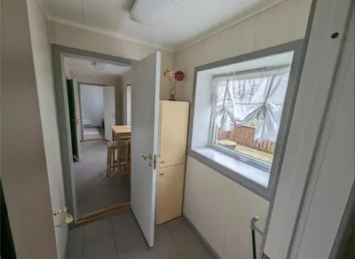 an open door to a room with a window at Hardangerfjord panorama 2 in Kvam