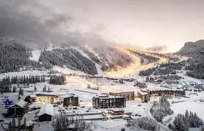 a resort in the mountains with snow on the ground at New! Apartment Fjellandsbyen Hemsedal Ski&bike in Kyrkjebøen