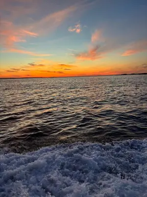 a view of the ocean at sunset at Fjærestua in Hitra