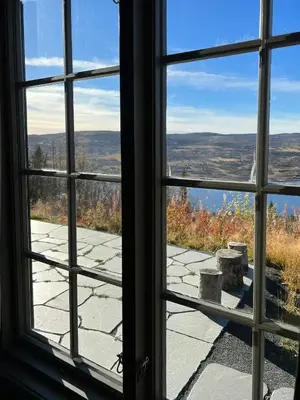 a window looking out at a view of the mountains at Cabin With Panoramic View At Vaset in Ron