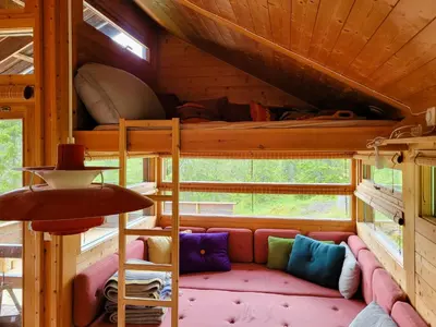 a room with a couch in a tiny house at Close To Nature In Ål Cabin At Haglebu in Eggedal