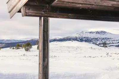 a view of a snow covered mountain from a cabin at Architect Drawn Holiday Home Near Rondane Park in Høvringen