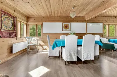 a dining room with a table and chairs at Peaceful Smallholding With Yoga Studio in Traut