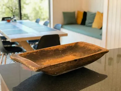 a wooden bowl sitting on top of a table at Modern Mountain Cabin In Gaustatoppen Nature Park in Rjukan