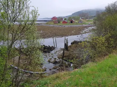 a body of water with at Architect-Designed Cabin With Beach Nearby in Lensvik