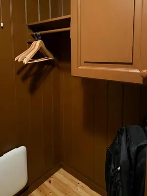 a kitchen with a cupboard and a hanger at Family-Friendly Cabin In Nordseter Near Ski Trails in Lillehammer
