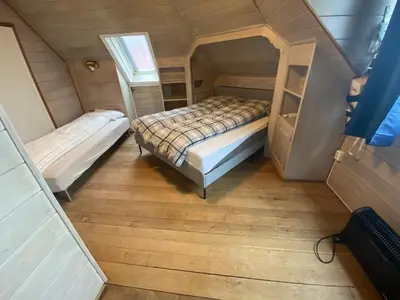 an overhead view of two beds in a tiny house at Central appartment with a nice view in Bergen
