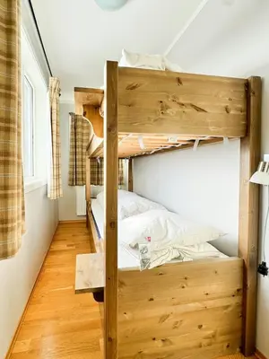 a bedroom with two bunk beds in a room at Big And Modern Apartment At Beitostølen in Beitostøl