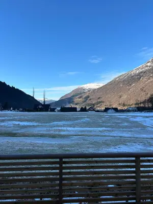 a view of a river with snow covered mountains at Lovely apartment in beautiful Loen in Loen