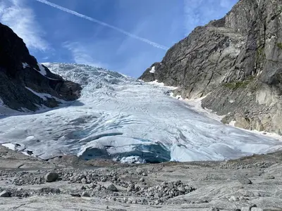 a large chunk of snow on a mountain at Villa Fjellheim in Luster
