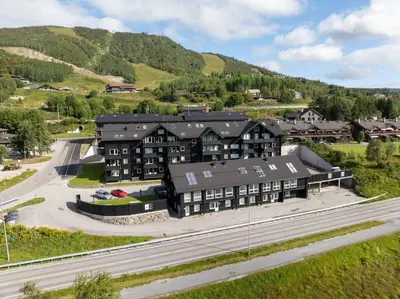 an aerial view of a hotel in the mountains at Geilo Gaarden - Geilo sentrum in Geilo