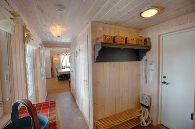 a hallway of a house with a living room at Family-Friendly Cabin With Stunning Outdoor Access in Beitostøl