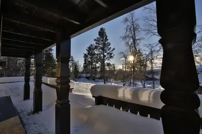 a winter view from a porch with snow on the ground at Relaxing Getaway With Sauna And Terrace in Beitostøl