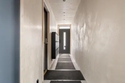 a corridor of a hallway with a hallway at Comfy studio apartment 200m from bryggen in Bergen