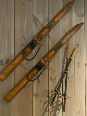 four wooden baseball bats hanging on a wall at Modern Apartment With Views Of Trysil Mountain in Trysil
