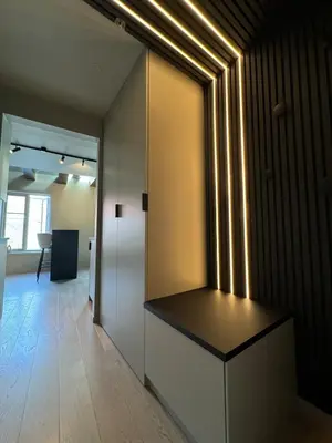 an office with a hallway with a light on the wall at Central apartment in idyllic Bakklandet in Trondheim