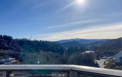 a view of the mountains from a balcony at Lovely Home In Flaktveit With Wifi in Blinde