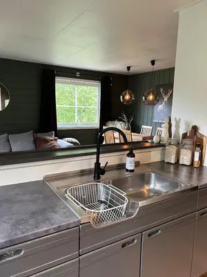 a kitchen with a sink and a counter top at Cabin in Valldalen, Røldal in Røldal