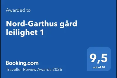 a blue sign with the words nord caruthiusgard lightweight at Nord-Garthus gård leilighet 1 in Hølera
