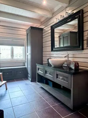 a bathroom with a sink and a mirror at Mountain Cabin With Panoramic Views At Hummelfjell in Os