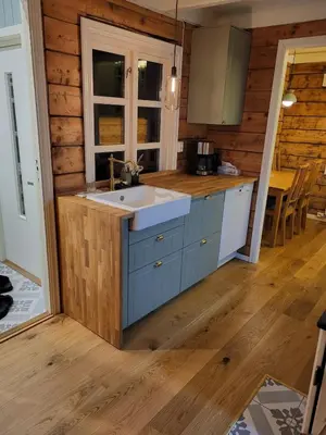 a kitchen with a sink and a counter top at Nygjerdet Gossen in Gossa