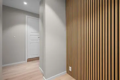 an empty room with a closet and a door at Bergen Beds Apartments I Nordic Retreat in Bergen
